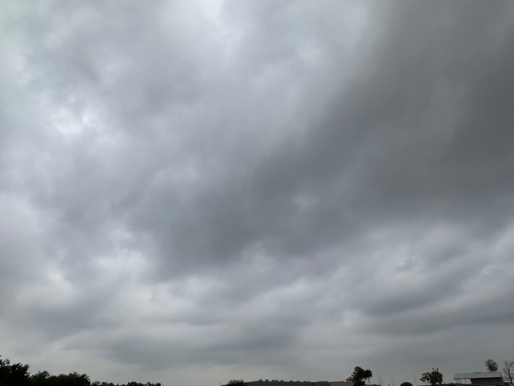 Sky full of heavy dark clouds.