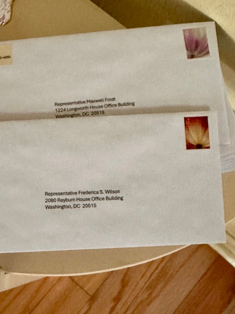 Two addressed and stamped envelopes.